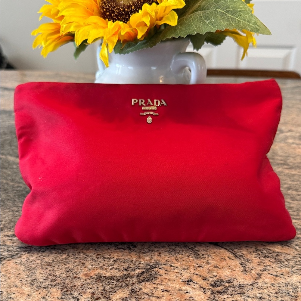 Prada Scarlet Red Pouch, nylon, has been used but still good.